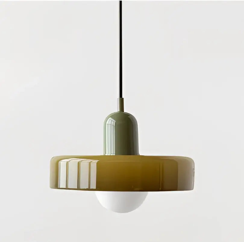 Modern yellow and olive green glass chandelier pendant light with a glossy circular shade and visible white bulb