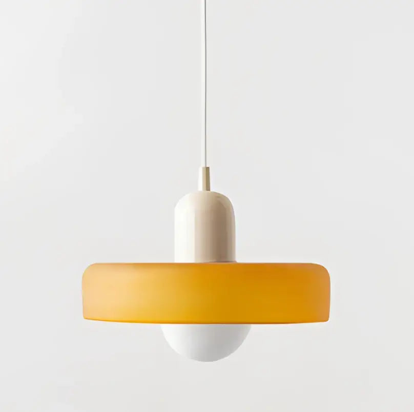 Modern yellow and olive green glass chandelier pendant light with frosted orange circular shade and white bulb suspended by cord