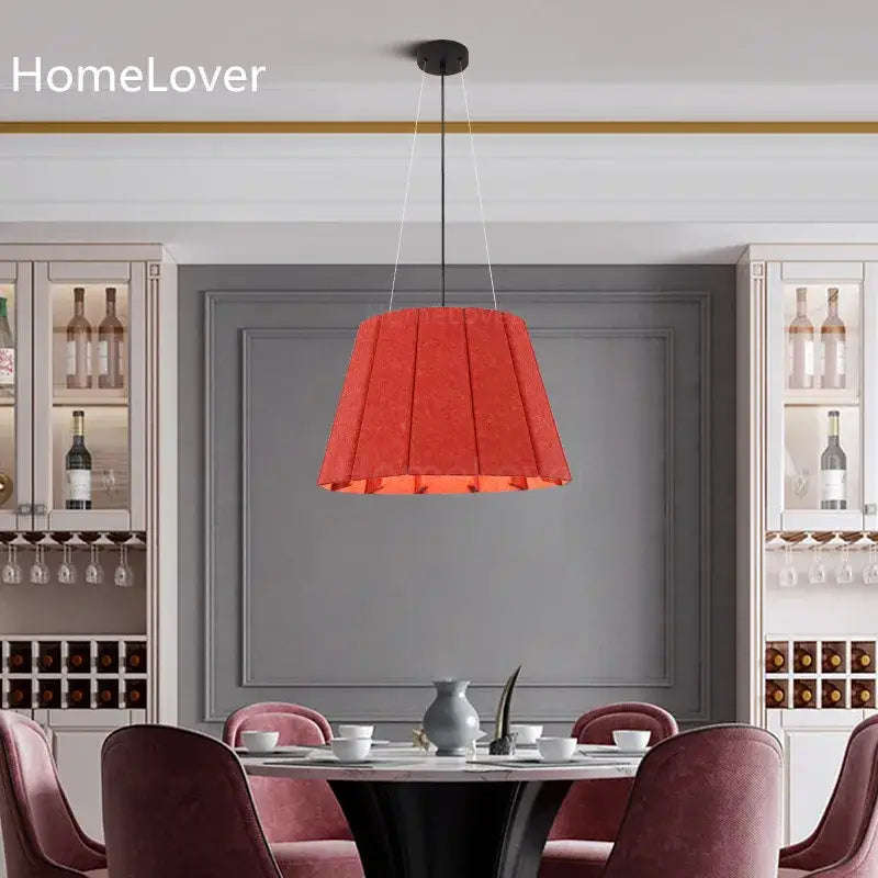 Modern red pleated fabric echo felt pendant light with sleek black ceiling fixture for dining room lighting