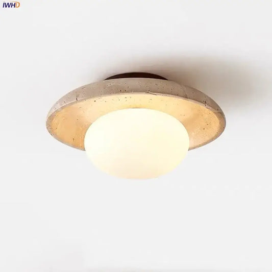 Modern yellow travertine glass ball led ceiling light with warm diffused glow and circular design for dining room decorbites glass ball
