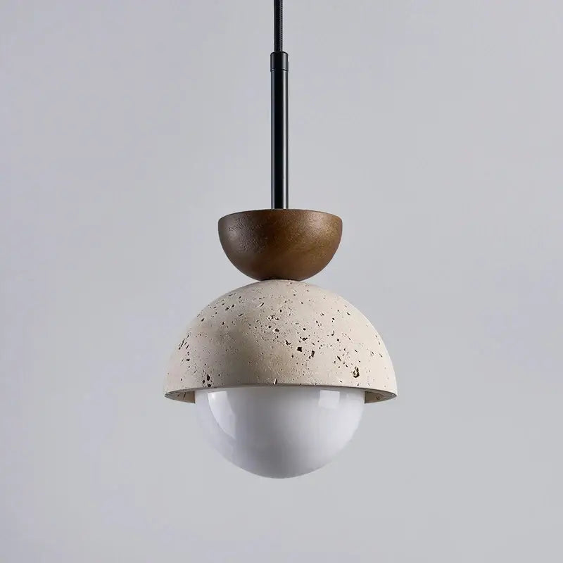 Modern pendant lights featuring a matte beige concrete dome and wooden half-sphere for kitchen island decorbites yellow travertine led