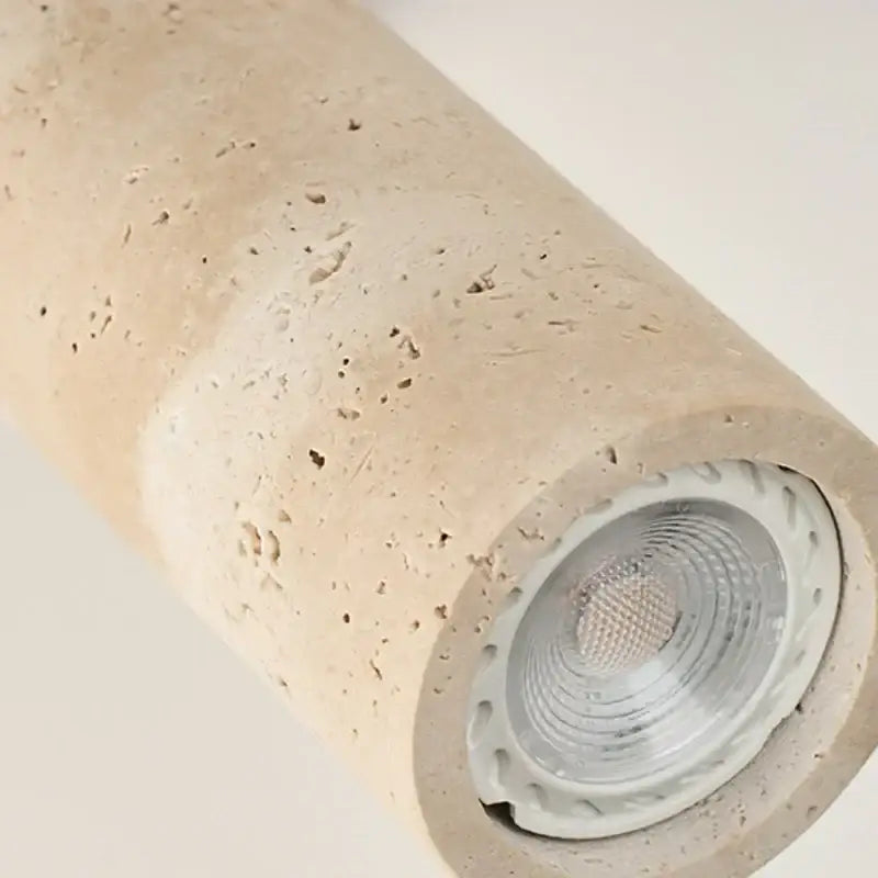 Beige concrete cylindrical modern yellow travertine led wall sconce with visible led bulb for bedroom decorbites led wall lighting