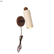 Modern yellow travertine led wall sconce with cream speckled cylindrical design and dark brown base for bedroom decorbites led wall use