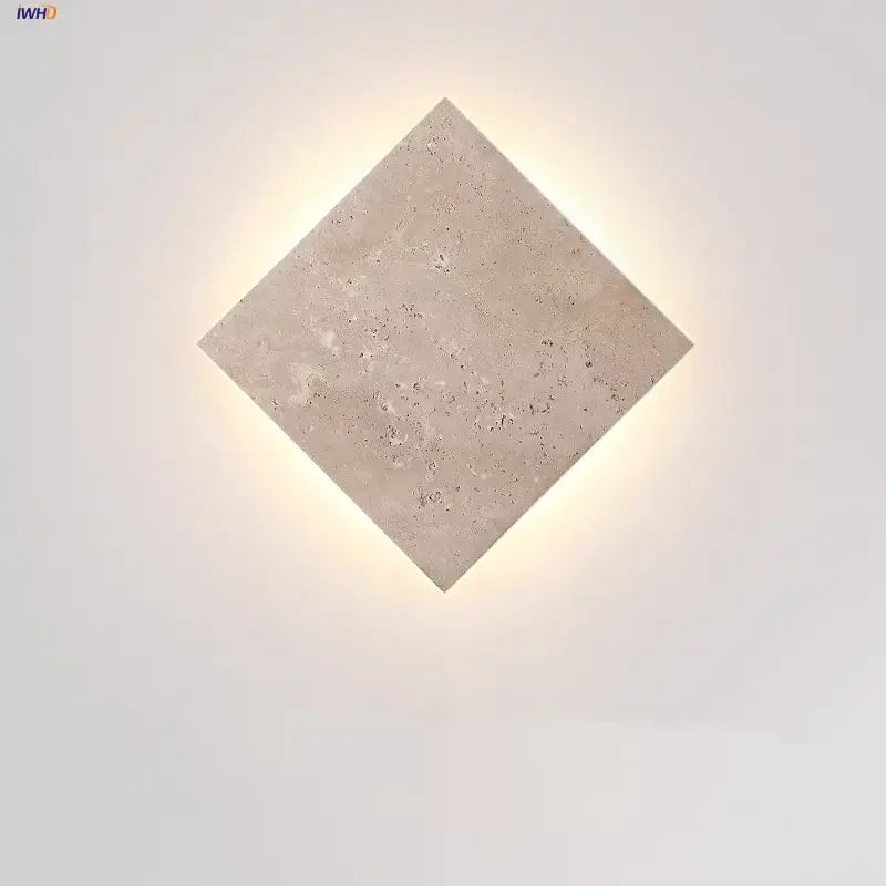 Modern yellow travertine square led wall lamp sconce with textured light beige surface and subtle embedded speckles