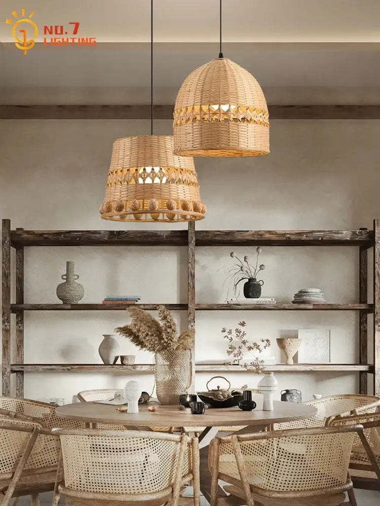 Two natural beige bamboo weave pendant lights with intricate geometric patterns hang above a dining table