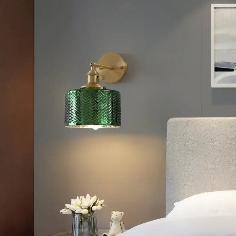 Modern zigzag green glass led wall lamp with textured pattern and brass arm for stylish bedroom lighting
