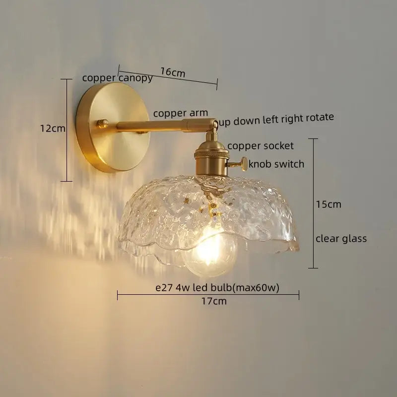 Vintage-style copper wall lamp with textured clear glass shade paired with modern zigzag green glass led bedroom light