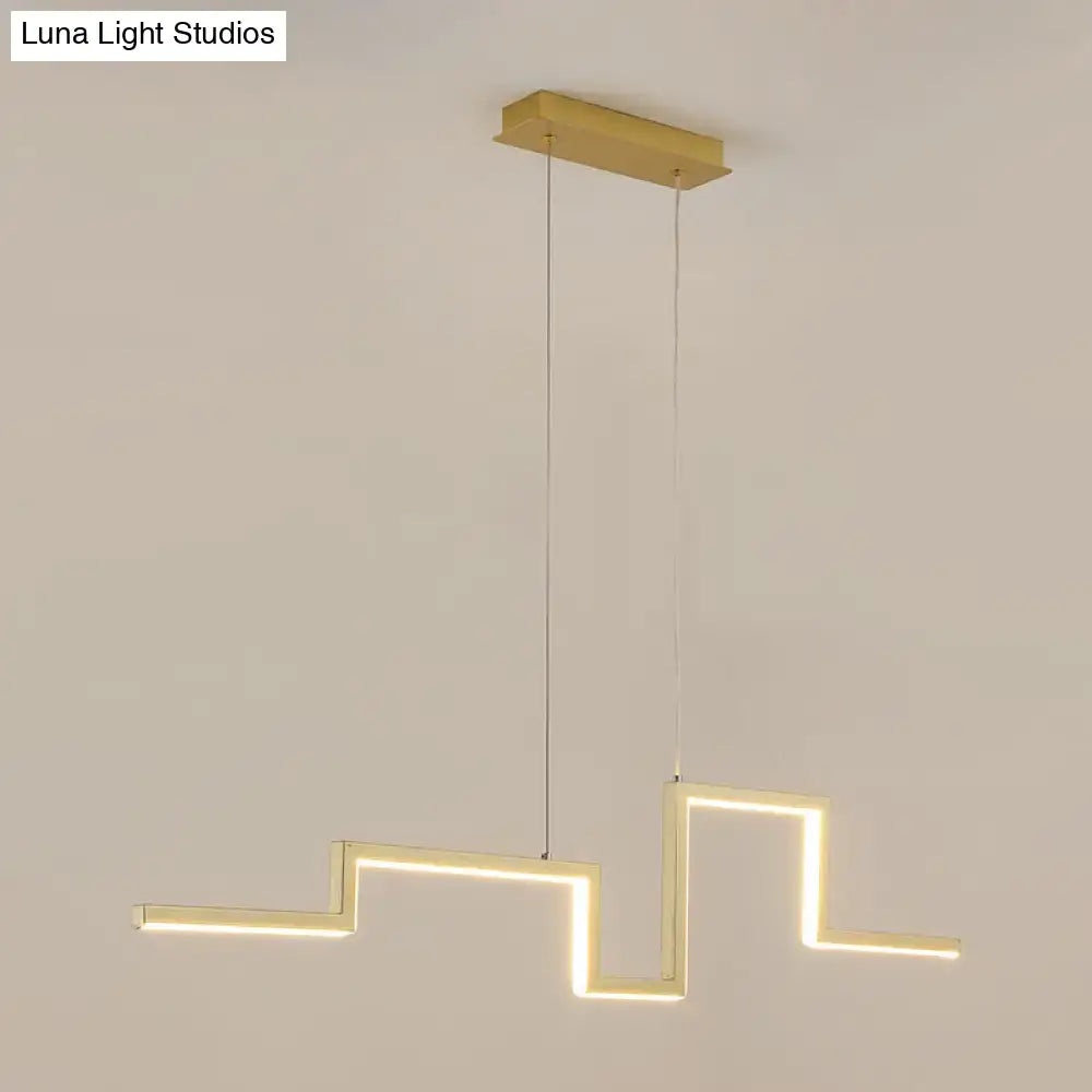 Modern zigzag linear metal hanging light fixture with gold finish and illuminated rectangular bars for dining room use