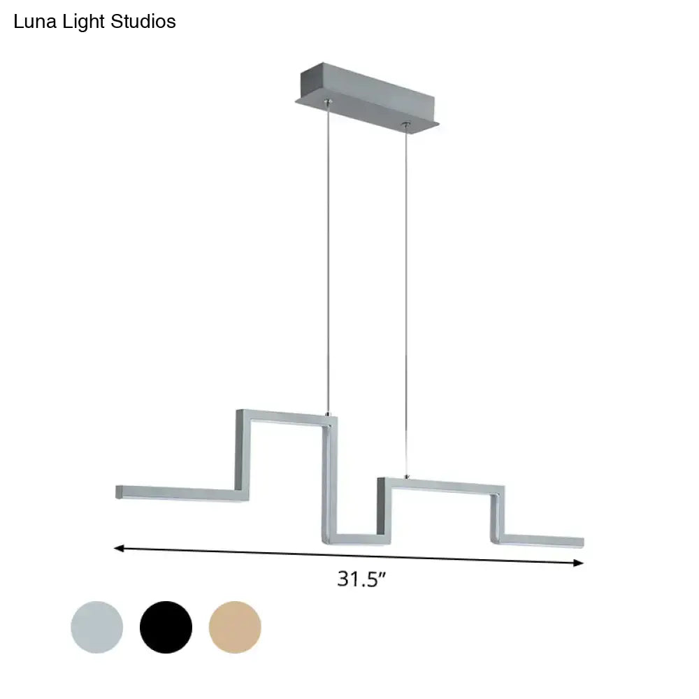 Modern silver linear metal hanging light fixture with geometric zigzag design and rectangular ceiling mount for dining room