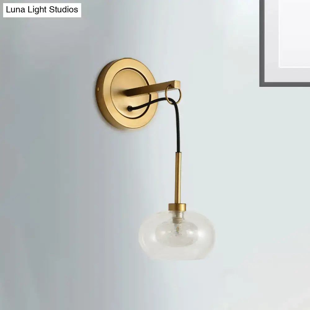 Brass-finished wall sconce with amber white glass globe shade and black cord for modernist bedroom lamps with satisfaction guarantee