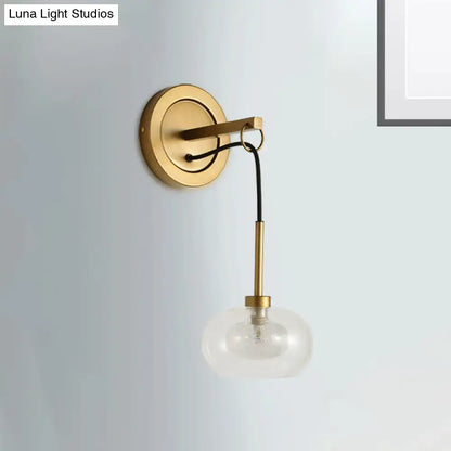 Brass-finished wall sconce with amber white glass globe shade and black cord for modernist bedroom lamps with satisfaction guarantee