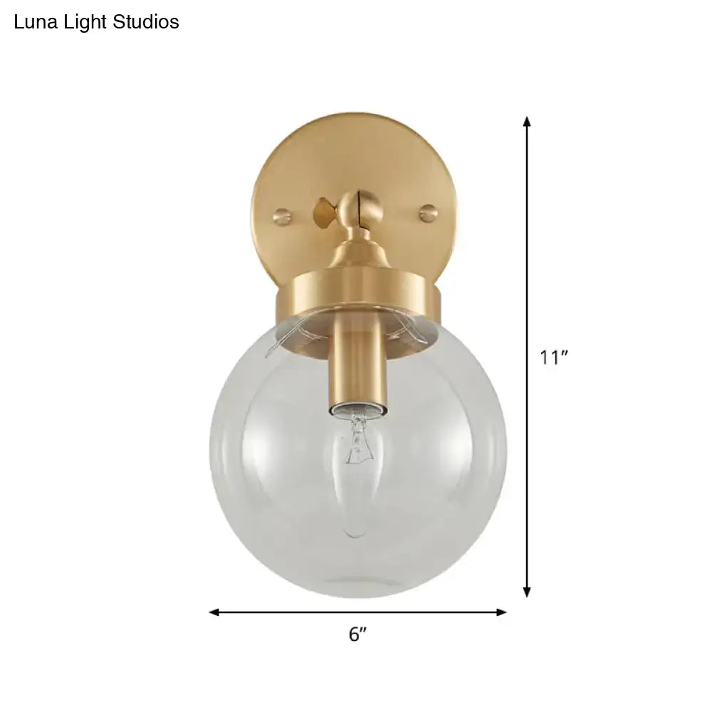 Modernist ball brass wall lamp with spherical glass shade wall mounted 11-inch height 6-inch diameter for bedroom