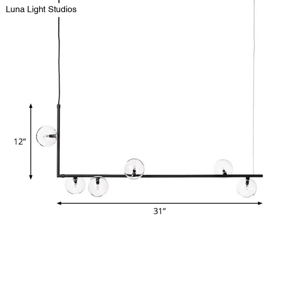 Decorbites modernist black metal linear pendant light with five clear glass globe bulbs and warm white lighting