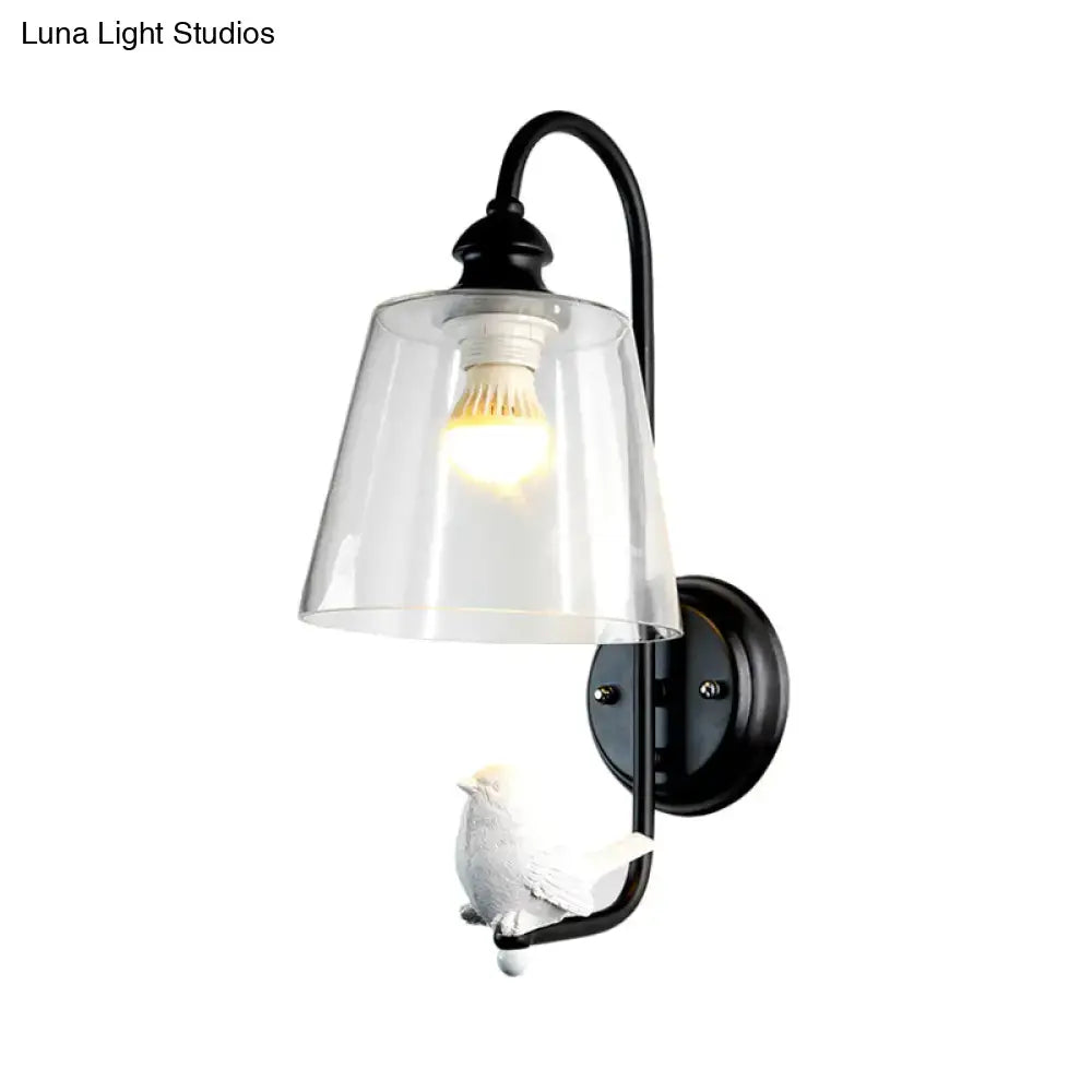 Modernist black metal cone wall lamp with clear glass shade and white ceramic bird figurine for bedroom use