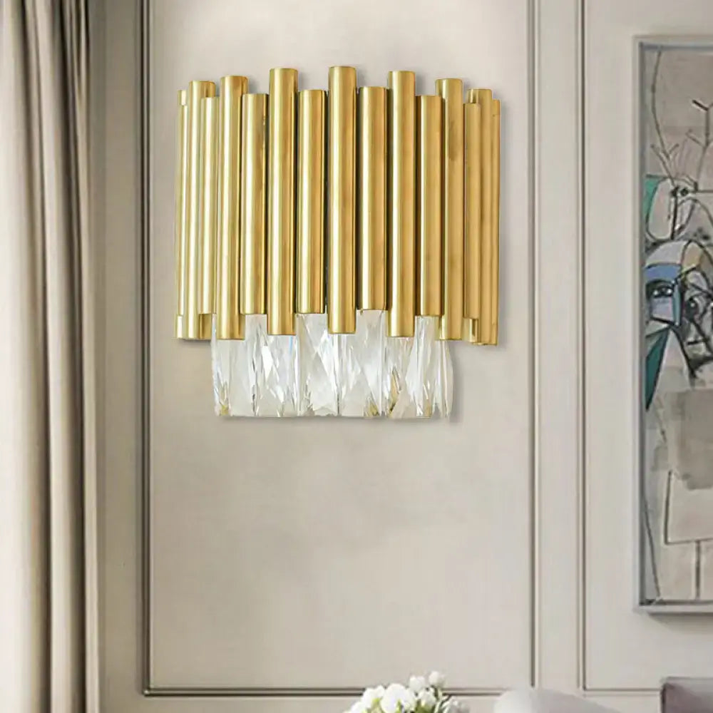 Gold-toned modernist wall light with vertical brass rods and clear faceted crystal fringe for living room decor
