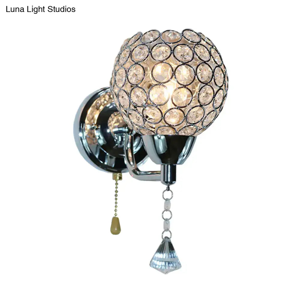 Modernist chrome and crystal wall sconce light with spherical globe and faceted pendant direct wired electric fixture