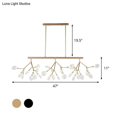 Gold-toned branch-style chandelier with modernist clear glass teardrop pendants in decorbites firefly hanging island light