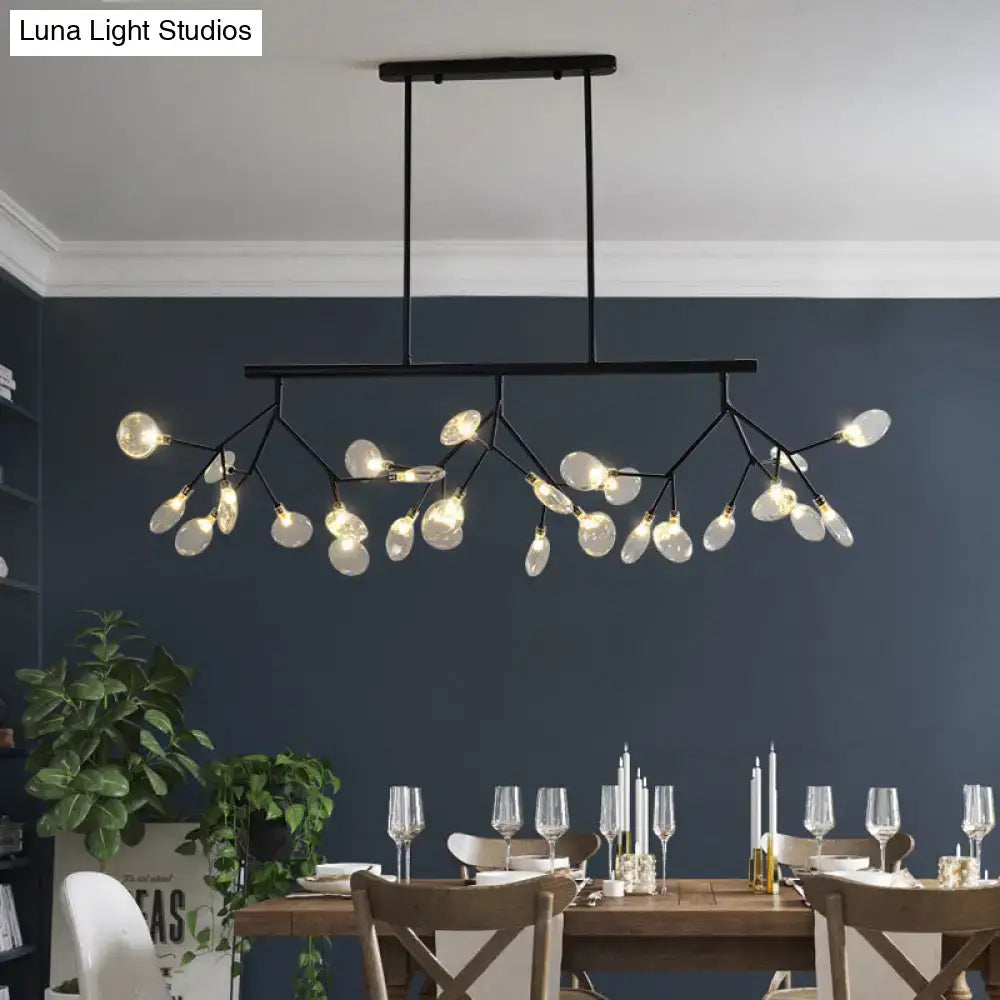 Black metal firefly hanging island light with branching arms and clear glass globe bulbs for modernist clear glass decor