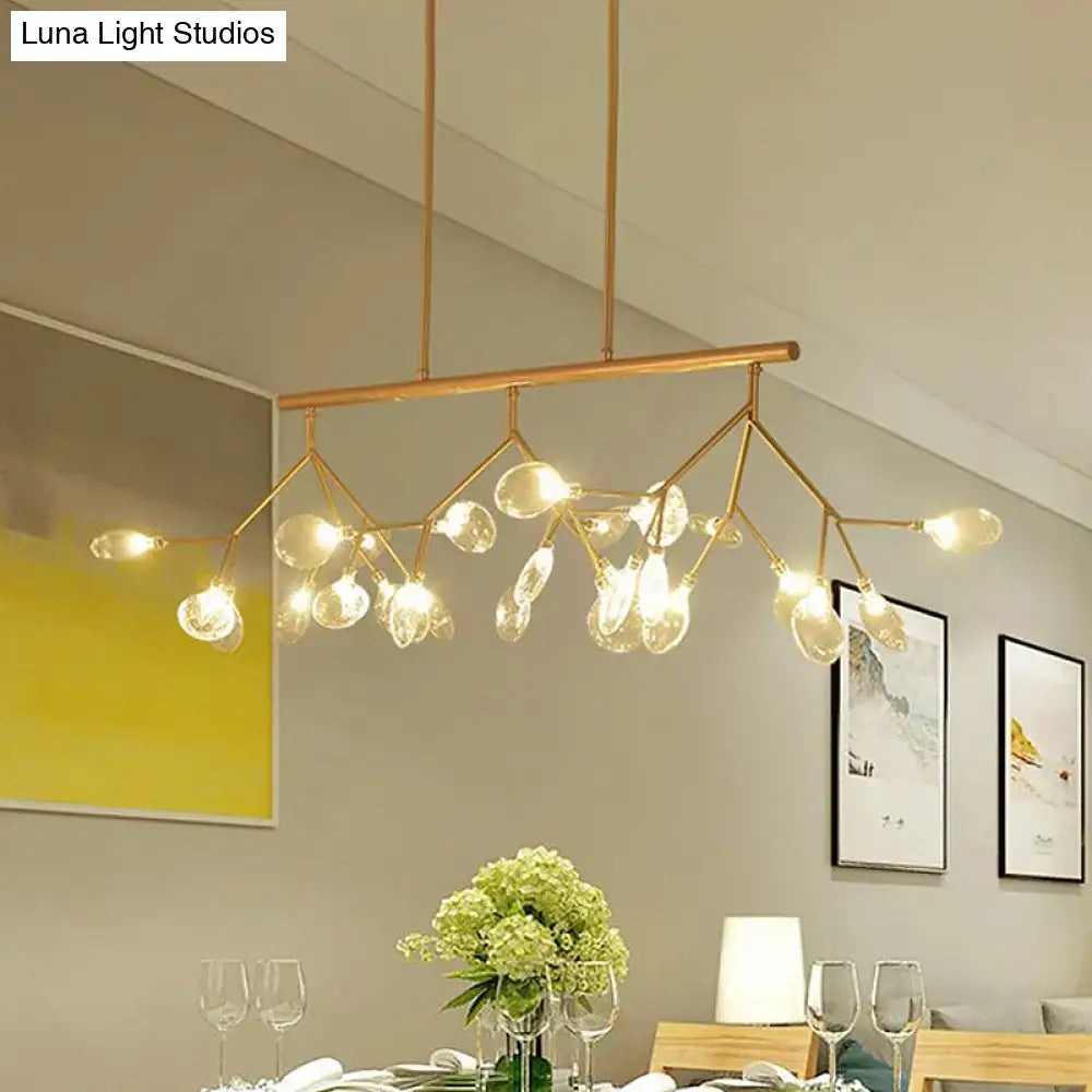 Gold-toned DecorBites™ firefly hanging island modernist clear glass dining table ceiling pendant with branching arms and globe bulbs