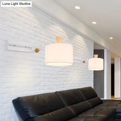 DecorBites™ DecorBites™ Modernist Drum Fabric Wall Sconce with Rotatable Arm and White Finish