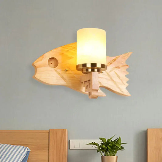 Modernist fish wood backplate wall sconce with warm-toned wood, cracked glass frosted shade, and brass accents