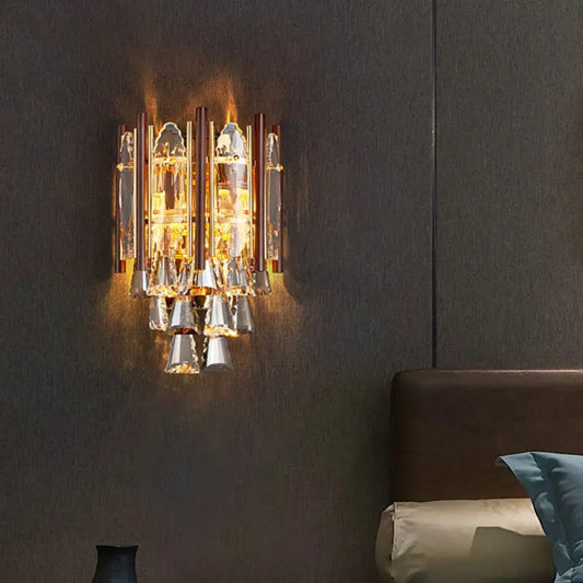 Gold-toned modernist wall lamp with beveled k9 crystal and dangling bell-shaped glass elements for 110v-120v use