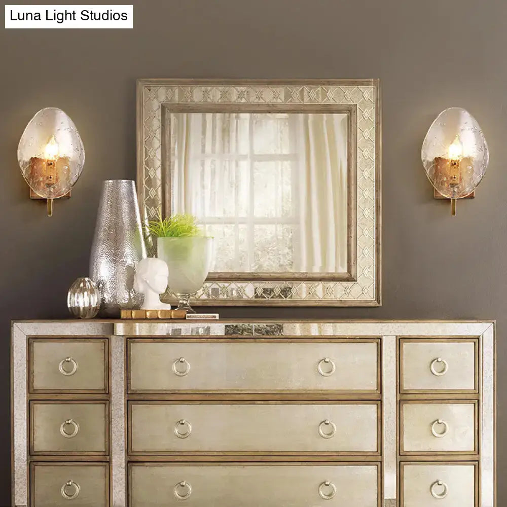Silver mirrored dresser with ring pulls and decorative frame paired with modernist gold glass shield wall lamp for e12 e14 bulbs