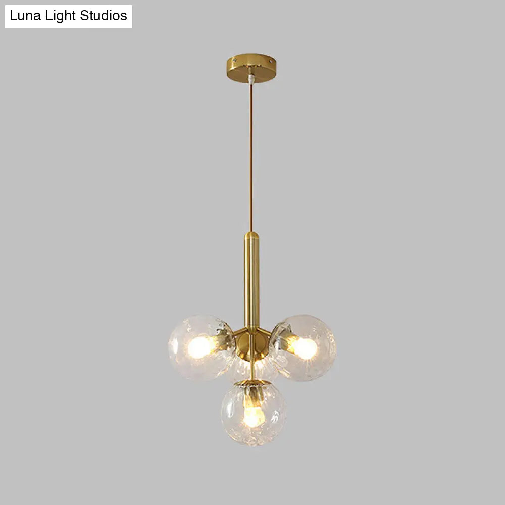 Lámpara colgante modernista dorada con forma de globo - Cristal transparente, 4 cabezales