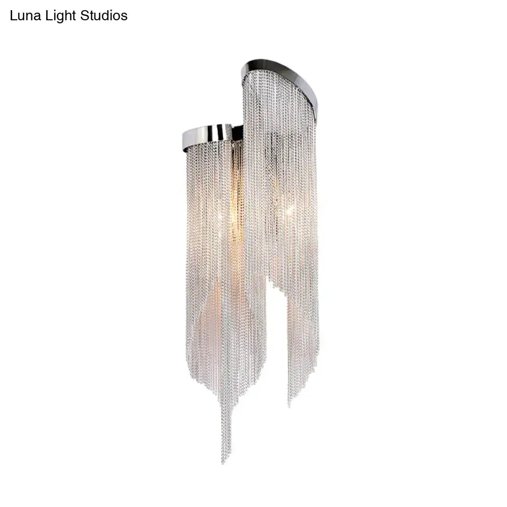 Modernist silver aluminum tassel wall sconce with silver chain curtain and sleek modern design for living room light