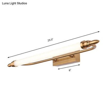Modernist gold tube metal vanity wall light with frosted glass cylinder and ornate spearhead ends for bathroom use