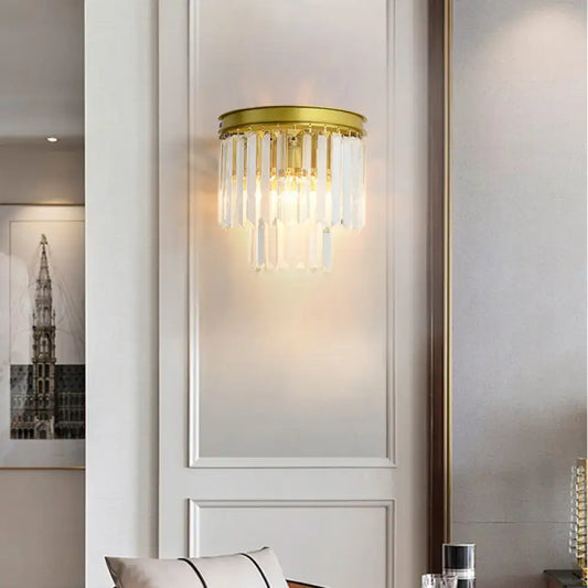 Modernist gold wall lamp featuring clear faceted crystal rods designed for elegant living room lighting