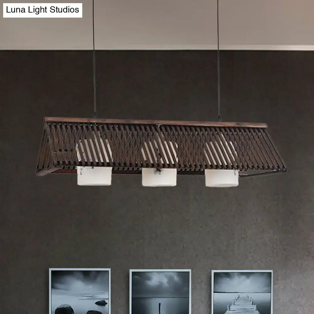 Rustic wooden pendant light with woven slat design and three white cylindrical shades in beige brown modernist linear island lighting