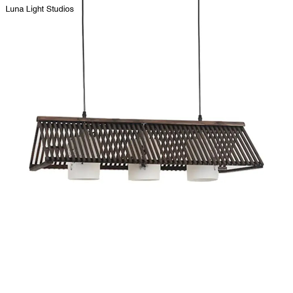 Beige brown decorbites modernist linear island lighting with dark wood slats and three white cylindrical glass shades