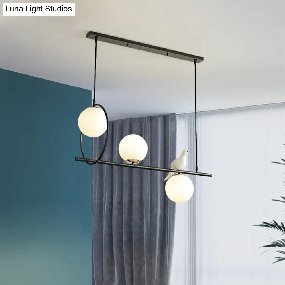 Modernist milk glass pendant black dining room light with three frosted globes and decorative white bird accent 220v-240v 110v-120v