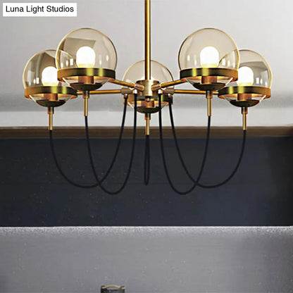 Lámpara de techo colgante modernista de múltiples luces: Cristal transparente global, negro/dorado, pantalla interior esférica de cristal ahumado