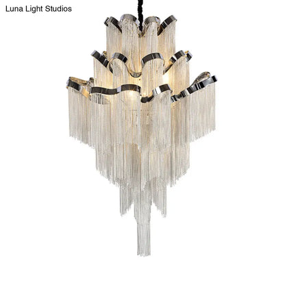 Lámpara de techo de estilo nórdico modernista con cadena metálica y 8 luces, color plata.