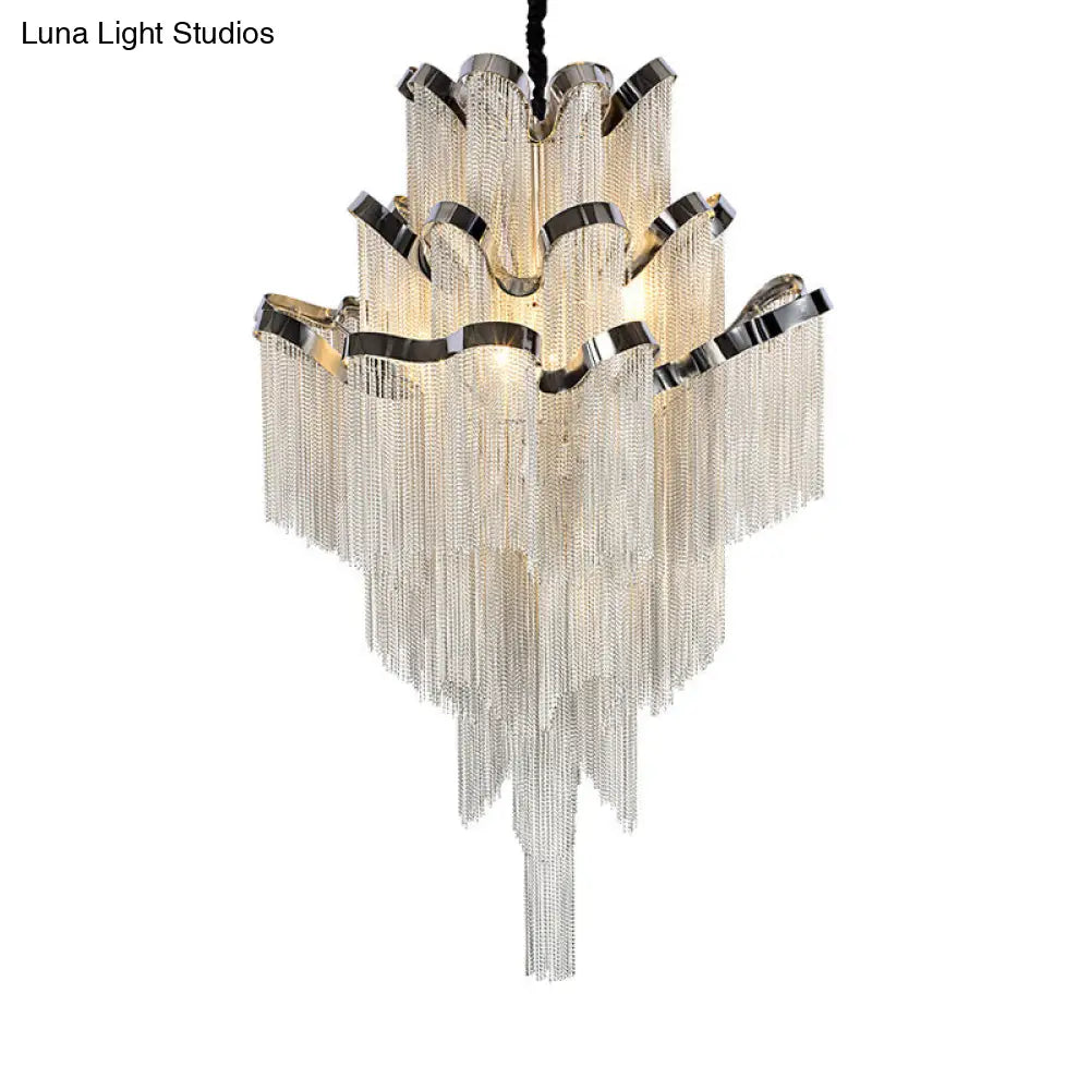 Lámpara de techo de estilo nórdico modernista con cadena metálica y 8 luces, color plata.