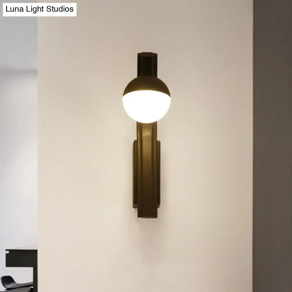 Modernist orb sconce wall lamp in matte black with spherical frosted glass globe for stairway lighting