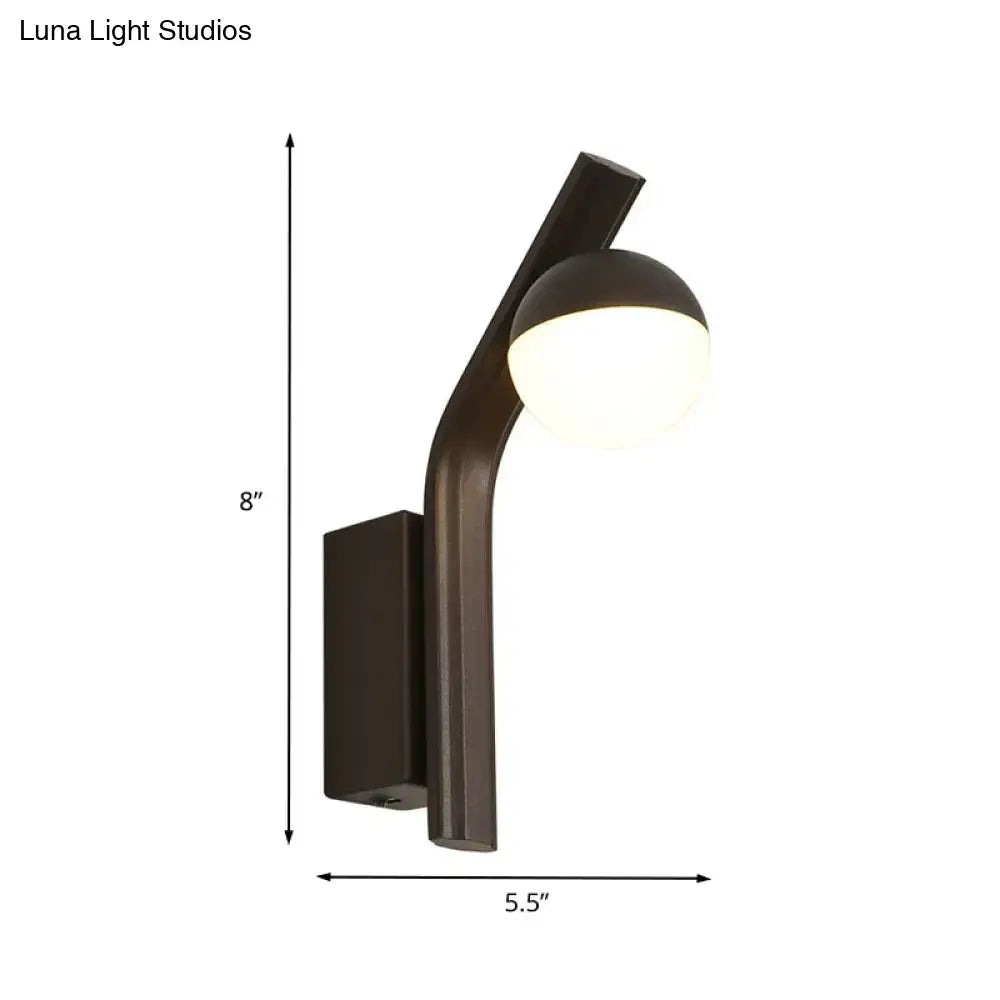Modernist orb sconce black wall lamp with sleek curved arm and frosted glass shade ideal for stairway lighting