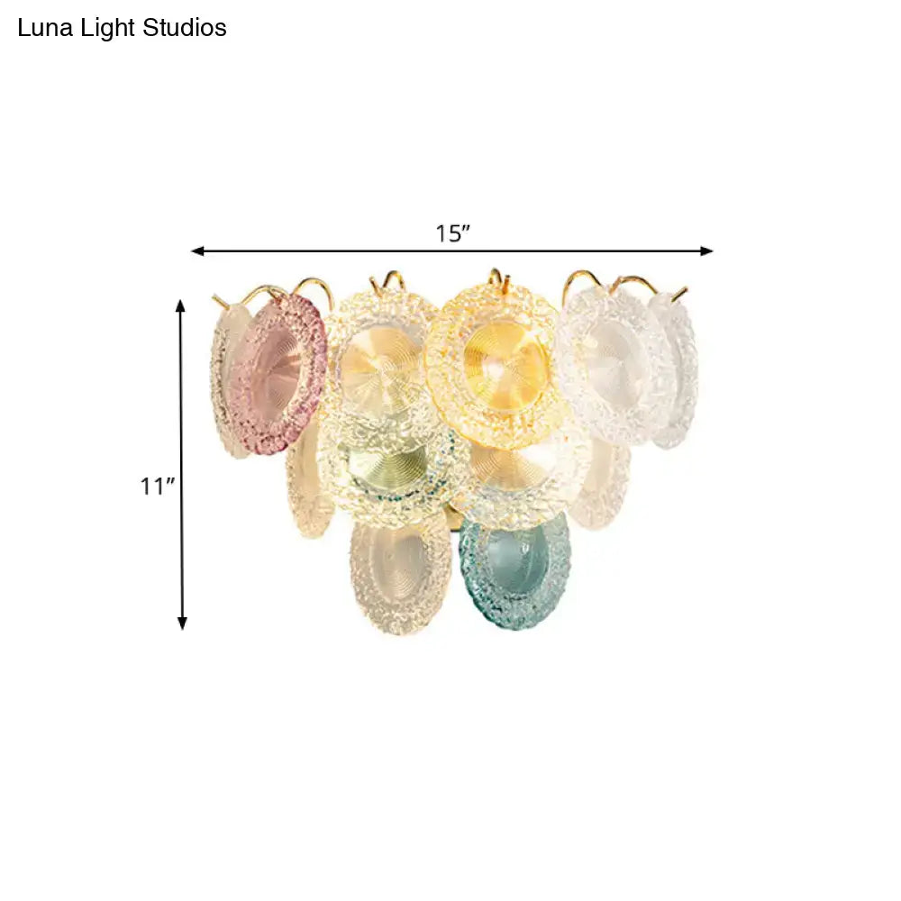 Pastel-colored glass chandelier with lace-like texture and gold hardware for dining room layered disc wall light