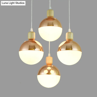 Modernist Rose Gold multi-pendant dining room light with Opal Glass Shade