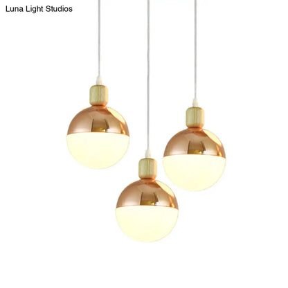 Modernist Rose Gold multi-pendant dining room light with Opal Glass Shade