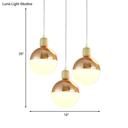 Modernist Rose Gold multi-pendant dining room light with Opal Glass Shade