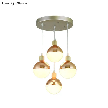 Modernist Rose Gold multi-pendant dining room light with Opal Glass Shade