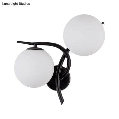 Black metal light fixture with silver black frame and milky glass shades for modernist bedroom lighting
