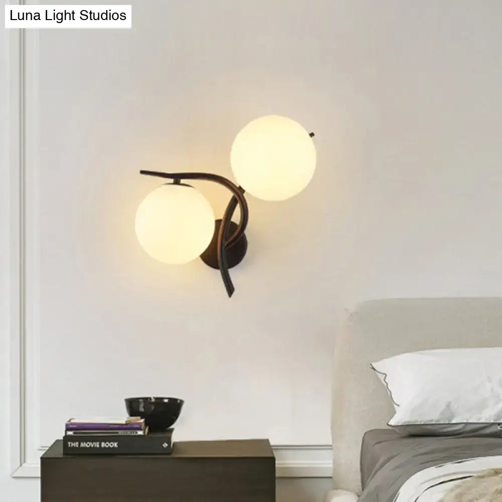 Modernist silver black light fixture with milky glass globe shades black metal wall sconce for bedroom use