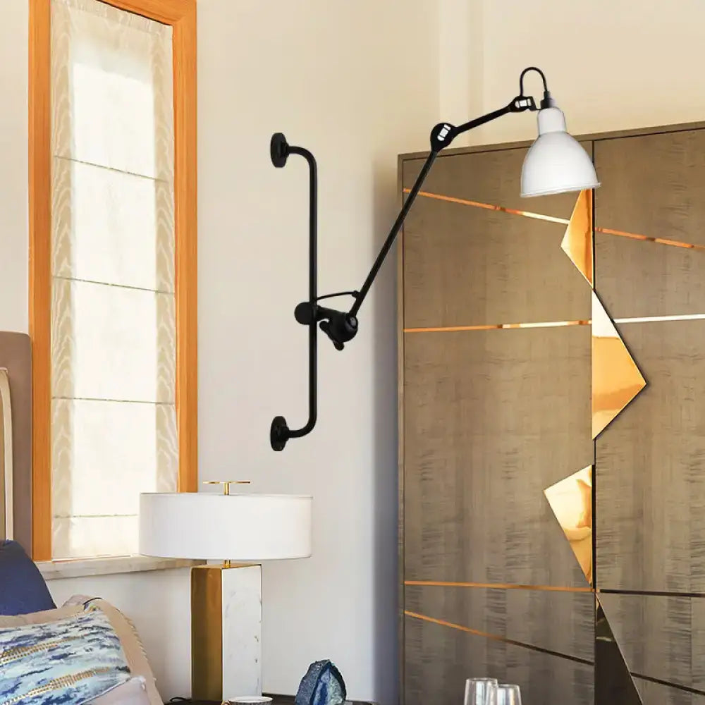 Black articulated wall light with a white conical shade in modernist style for dining room lighting