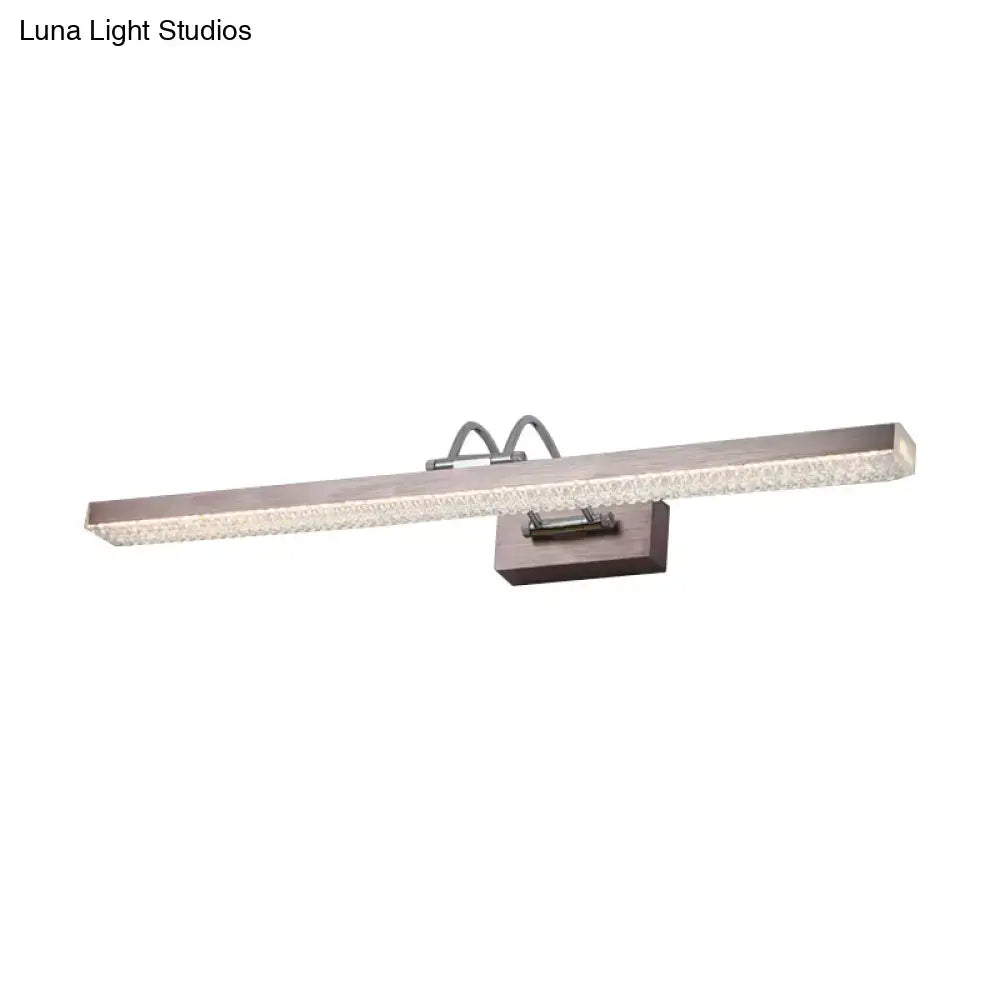 Modernist wall light with crystal led detail featuring a textured silver finish and frosted glass panel vanity sconce