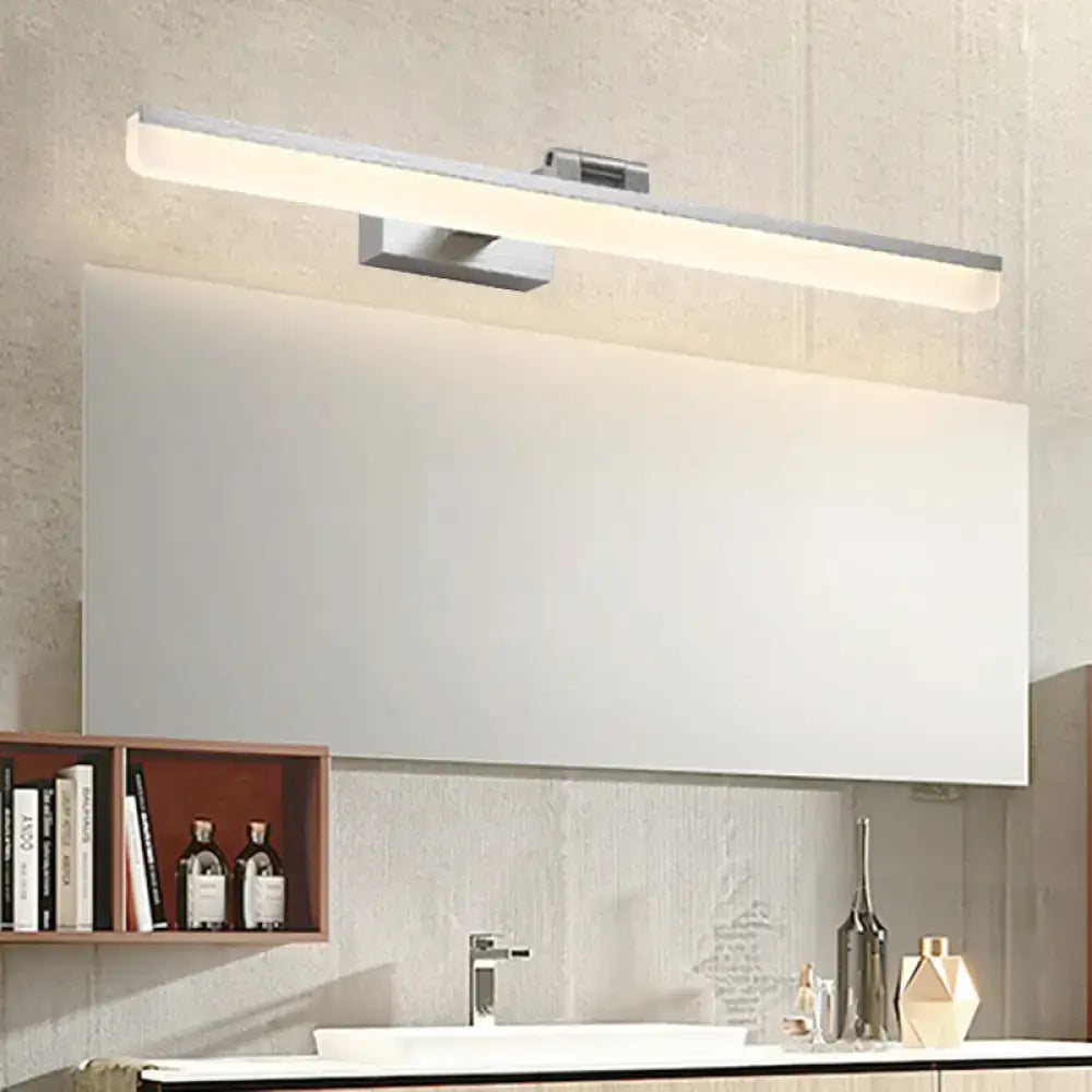 Modernist wall light with silver finish crystal led detail and soft white illumination for bedroom vanity use