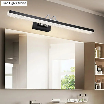Modernist wall light with sleek black and clear crystal led details in a rectangular design for bedroom vanity use